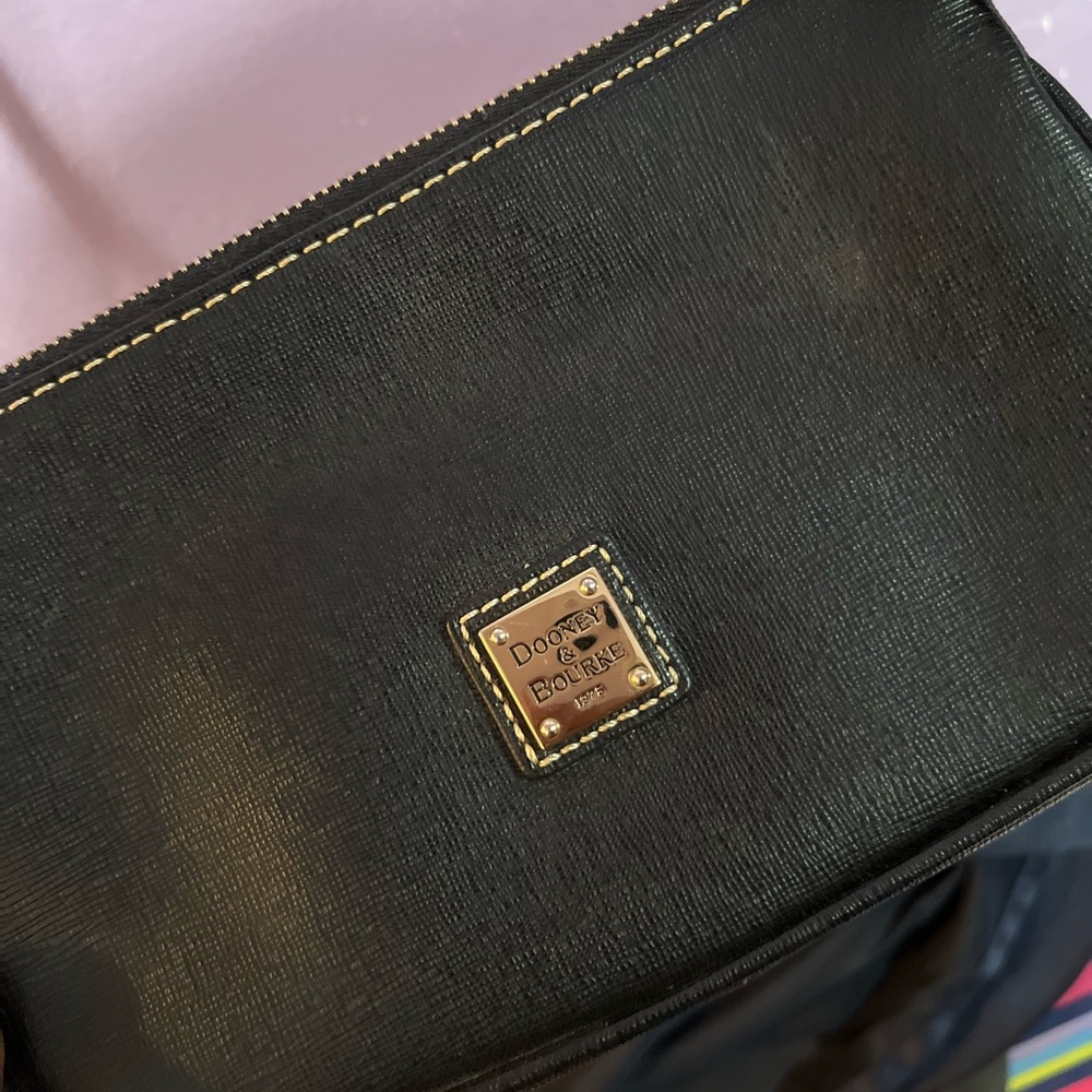 Dooney and Bourke mini looks brand new new inside clean a real Gem